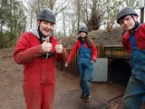 Two girls and a boy wearing helmets on an outdoor Ulysses adventure expedition