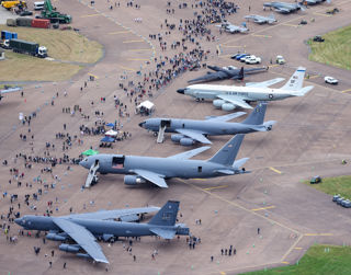 Aerial shot of four aircraft with crowds around them at RIAT24