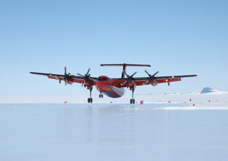 Dash 7 landing on the blue ice runway at Sky Blu.