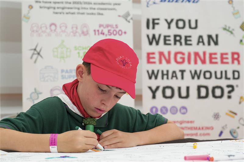 Boy at colouring table at RIAT for If You Were an Engineer competition RIAT24