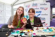 Girls building models for the Road to RIAT Blast Off competition